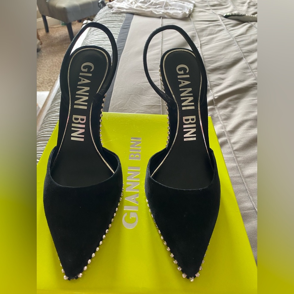 Black suede pumps